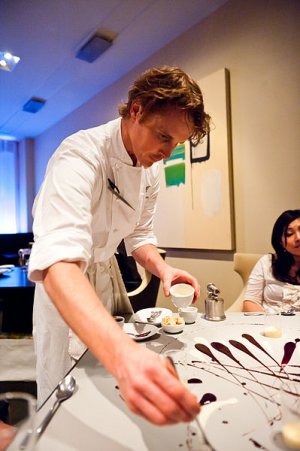Grant Achatz preparing dessert at Alinea, 2011. Photo by star5112.