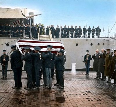 Unknown Soldier from World War I being taken from the USS Olympia at the Washington Navy Yard and transported to the United States Capitol to lay in state, 1921. Photo (since colorized): E.B. Thompson. Source: Wikimedia Commons.