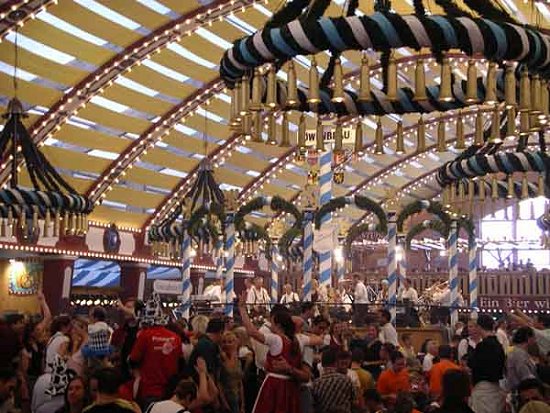 Inside a tent at Munich's Oktoberfest. Photo: Michael Chlistalla. Source: Wikimedia Commons.