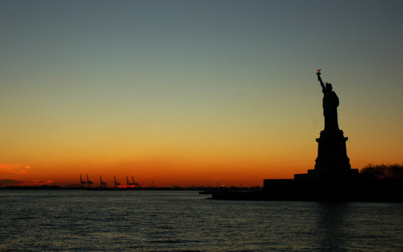 Statue of Liberty at sunset, New York Harbor. Photo: Markus Lukacevic. Source: Wikimedia Commons. License:  Creative Commons Attribution-Share Alike 3.0 Unported license.