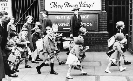 The Evacuation Scheme in Britain 1940. Children arriving at a London station to leave for the West Country. Photograph HU36871, Imperial War Museums.