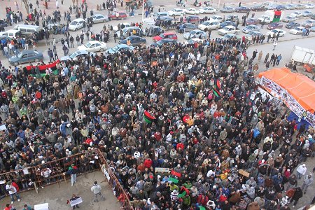 Crowds gather to protest the Qaddafi regime, February 2011. Photo: Al-Jazeera. Source: Wikimedia Commons.